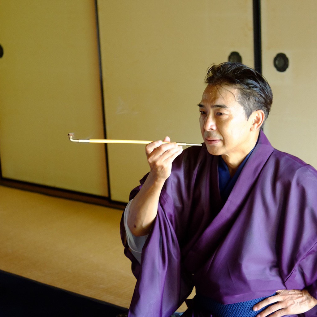 辰美屋の主人